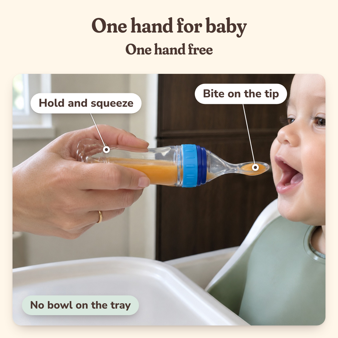 One hand holds and squeezes the MimoBé spoon while baby takes the bite, no bowl on the tray
