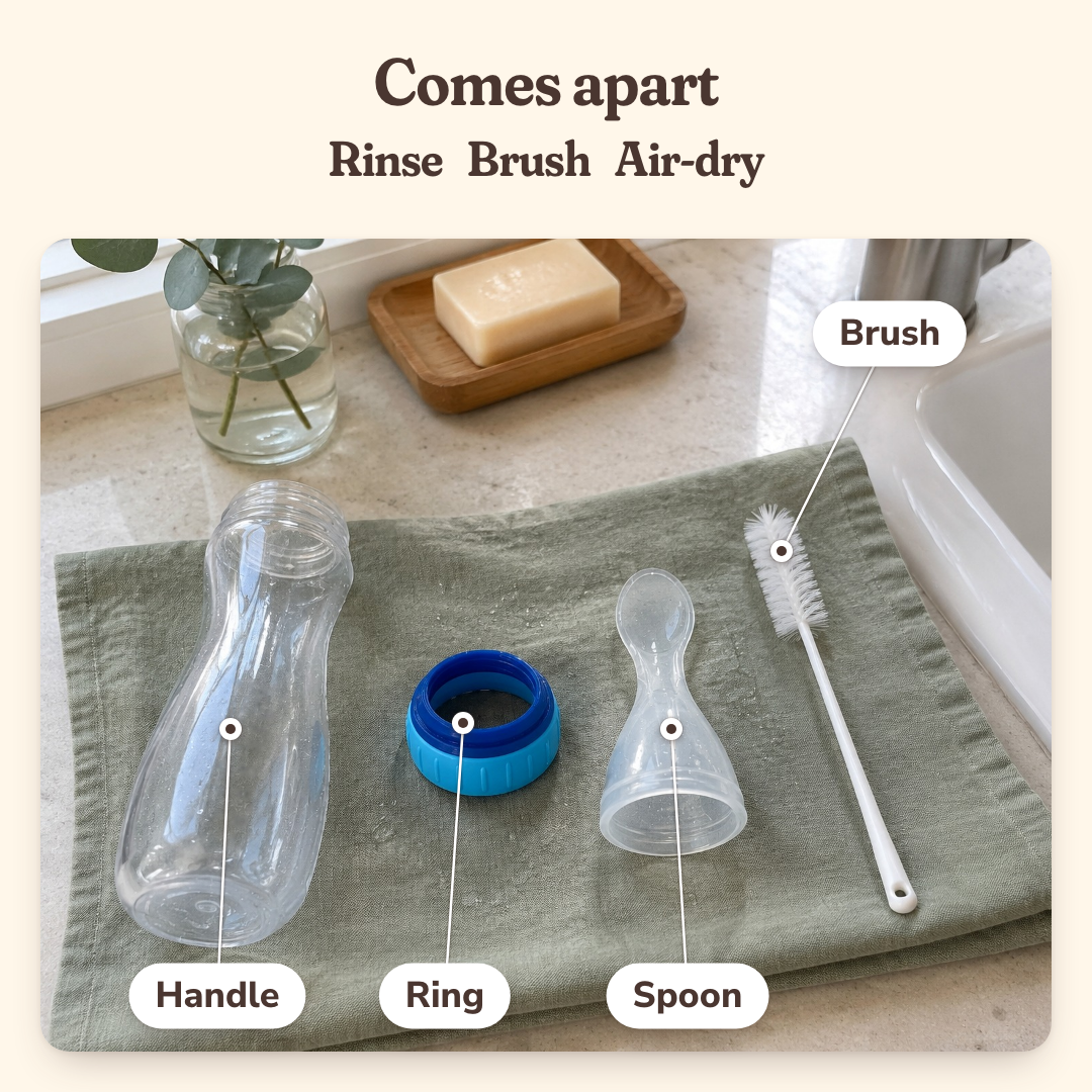 MimoBé comes apart to clean: handle, ring and spoon drying on a towel next to a brush